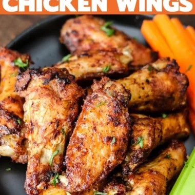 Crispy air fryer chicken wings ready to serve with dipping sauces.