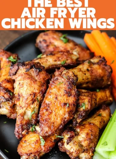 Crispy air fryer chicken wings ready to serve with dipping sauces.