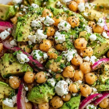 Chickpea Feta Avocado Salad with fresh ingredients in a bowl