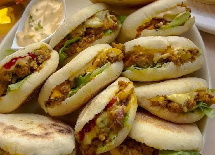 Delicious exploding buns filled with flavorful ingredients ready to be enjoyed