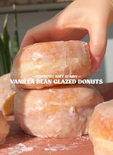 Freshly baked homemade glazed donuts ready to be enjoyed