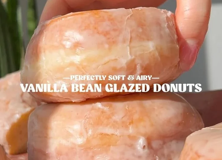 Freshly baked homemade glazed donuts ready to be enjoyed