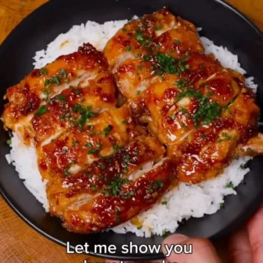 Delicious Honey Lemon Garlic Chicken served on a plate with fresh herbs