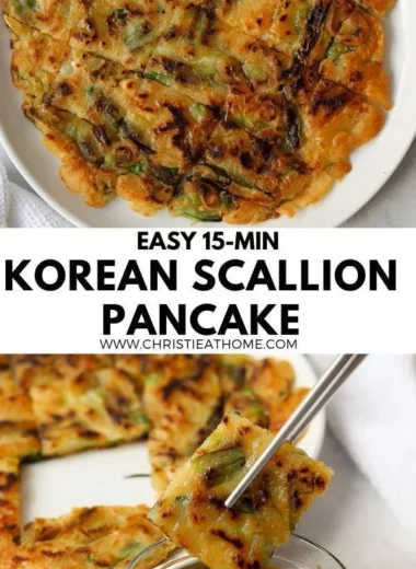 Korean scallion pancake served with dipping sauce on a wooden table.
