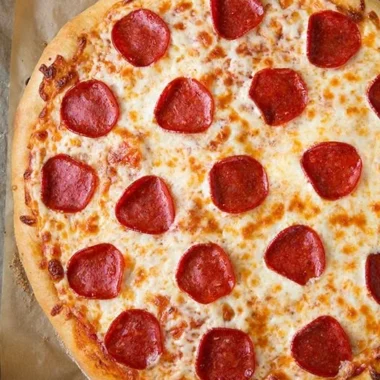 Delicious Pepperoni Pizza with extra cheese and fresh basil