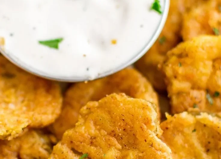 Crispy air fryer fried pickles served with dipping sauce