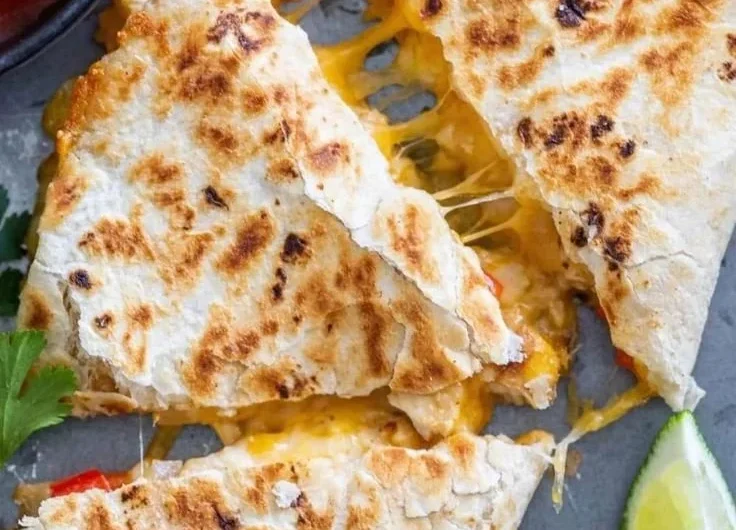 Delicious Chicken Quesadillas with melted cheese and fresh ingredients