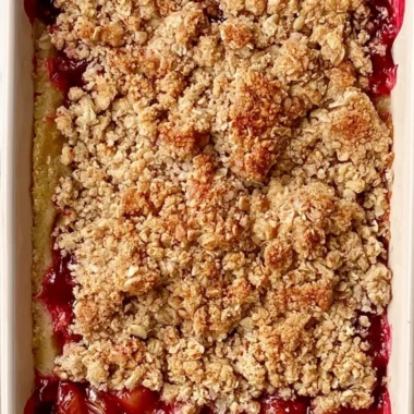 Classic rhubarb crumble bars with a golden crumble topping and vibrant rhubarb filling