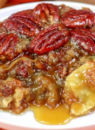 Dixie's delicious pecan pie cobbler served in a rustic dish, showcasing its golden crust.