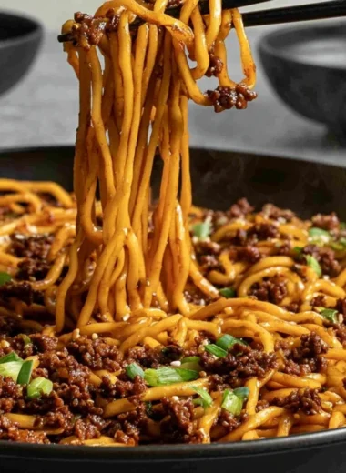 Easy Mongolian ground beef noodles dish with vegetables and sauce.