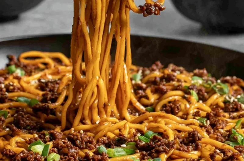 Easy Mongolian ground beef noodles dish with vegetables and sauce.