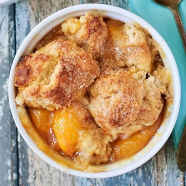Delicious Southern peach cobbler with fresh peaches and golden crust