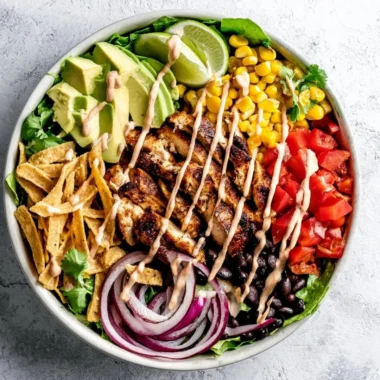 Bowl of Spicy Southwest Avocado Chicken Salad with colorful ingredients