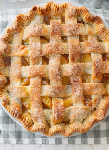 Homemade apple pie with golden crust and apple filling