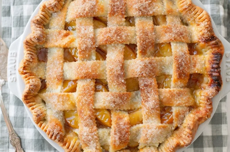 Homemade apple pie with golden crust and apple filling