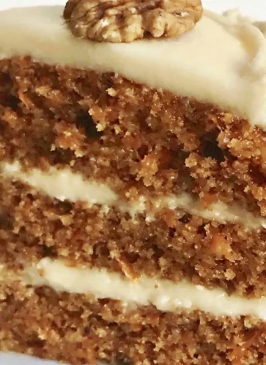Delicious classic carrot cake topped with cream cheese frosting