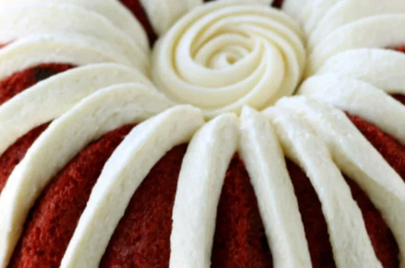 Deliciously moist Nothing Bundt Red Velvet Cake with cream cheese frosting