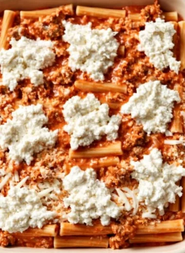 Delicious and hearty cozy baked ziti with cheese and marinara sauce
