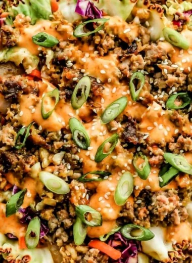 Inside out egg roll in a bowl with colorful veggies and protein