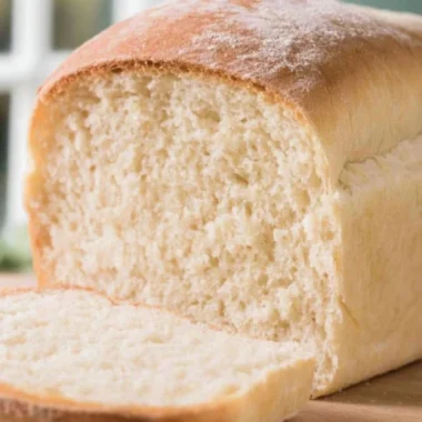 Freshly baked Farmhouse Sourdough Loaf with a golden crust and soft interior