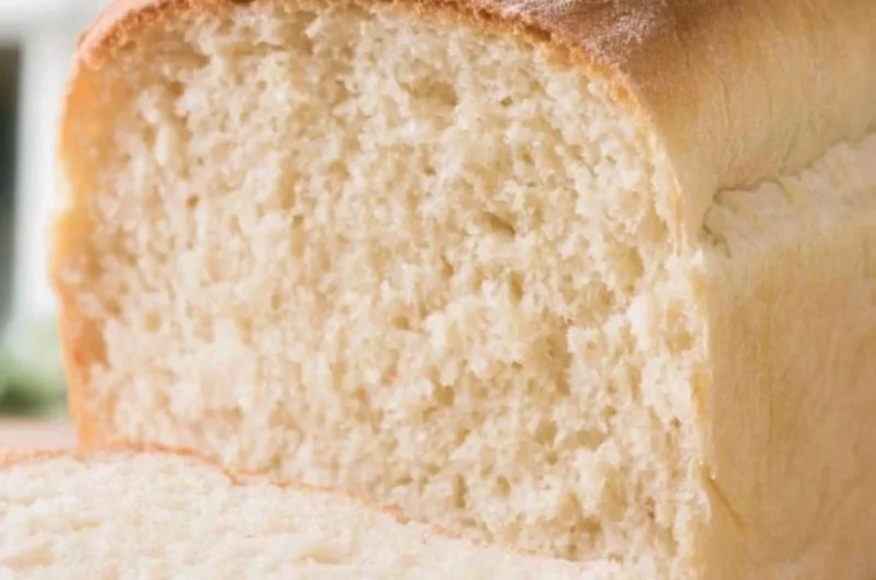 Freshly baked Farmhouse Sourdough Loaf with a golden crust and soft interior