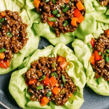 Ground beef lettuce wraps with fresh vegetables and sauces