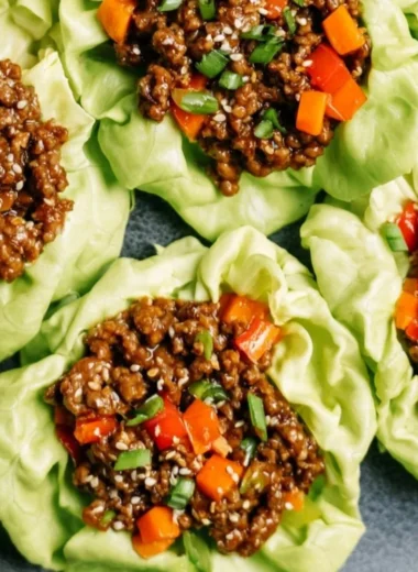 Ground beef lettuce wraps with fresh vegetables and sauces