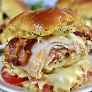 Kentucky Hot Brown Sliders with turkey and cheese on a platter