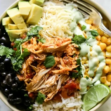 Delicious chicken burrito bowl topped with fresh ingredients and spices