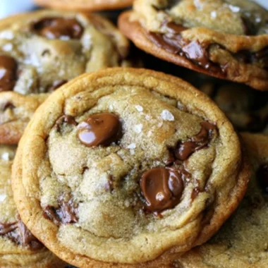 Golden brown butter chocolate chip cookies on a festive plate