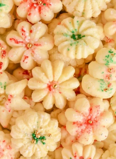 Cozy buttery spritz cookies on a festive plate