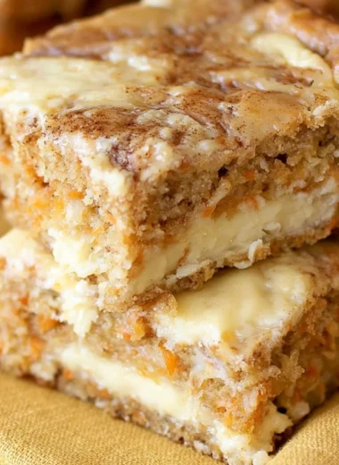 Delicious cozy carrot cake bars topped with cream cheese frosting