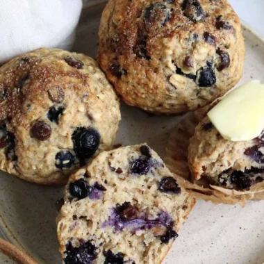 Cozy chocolate chip blueberry muffins freshly baked and ready to enjoy.