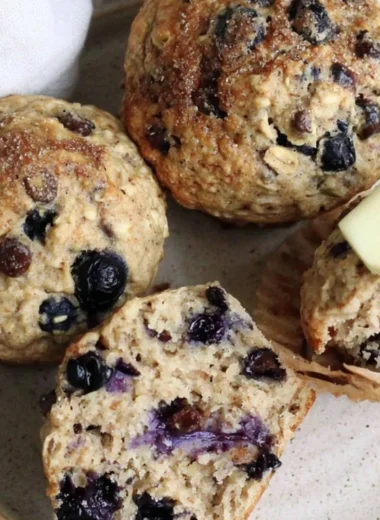 Cozy chocolate chip blueberry muffins freshly baked and ready to enjoy.