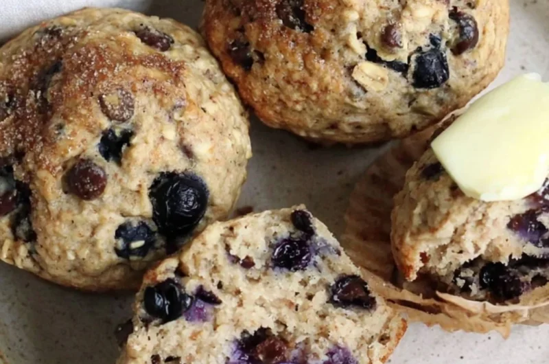 Cozy chocolate chip blueberry muffins freshly baked and ready to enjoy.