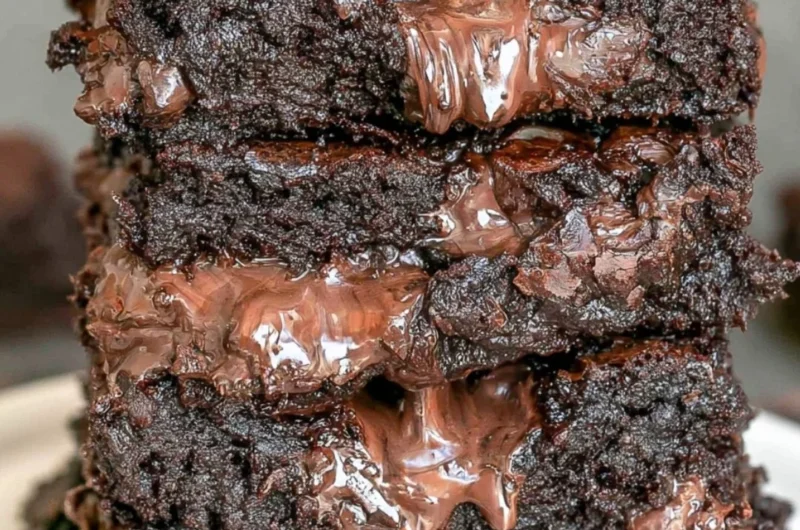 Delicious cozy fudge brownies on a rustic plate for guilt-free indulgence