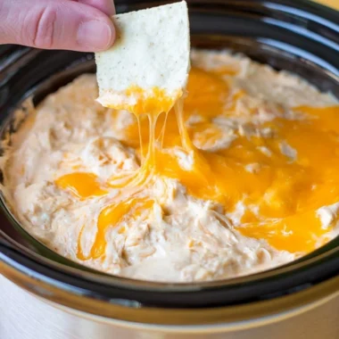 Creamy Maryland crab dip served with crispy crackers and fresh herbs